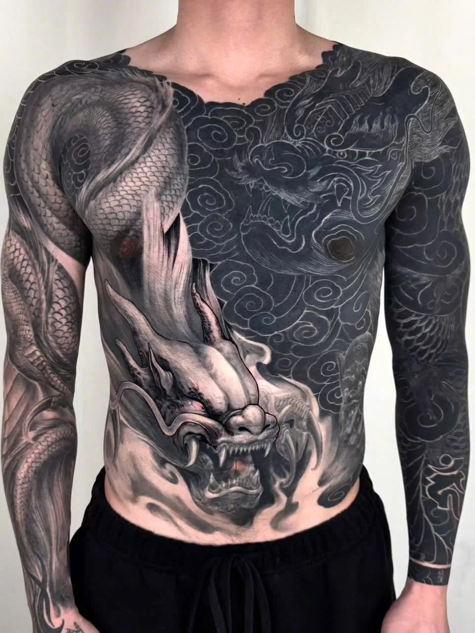 A dragon body suit by Yue Heng covering the chest, stomach and both arms.